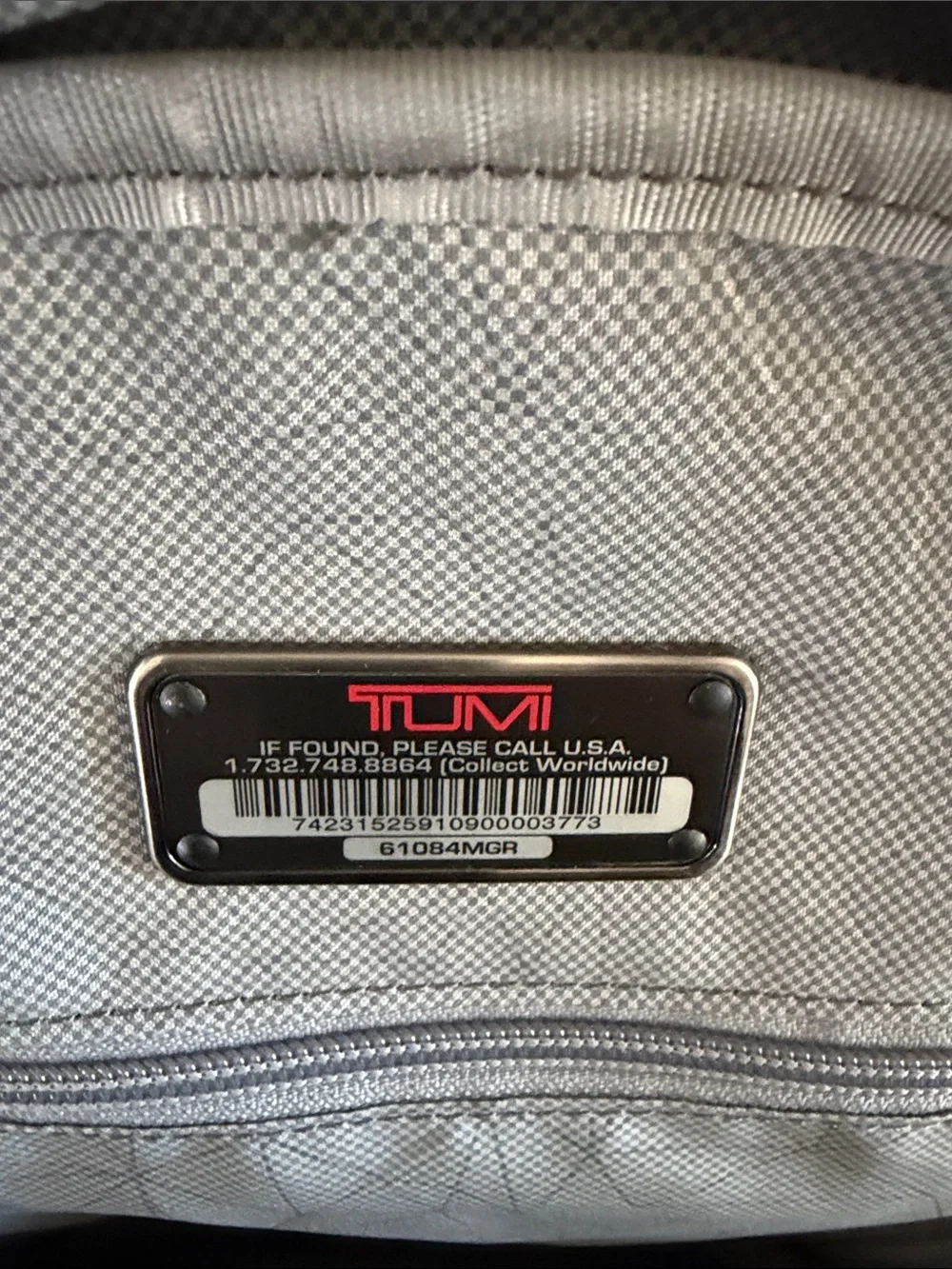 Tumi Blue-Gray Sling Backpack with Front Pocket -Never Used